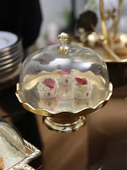 Another view of our Gold Scallop Dessert Stand, a perfect blend of vintage charm and bold elegance. Its stunning gold base makes it a showstopper for serving or gifting.