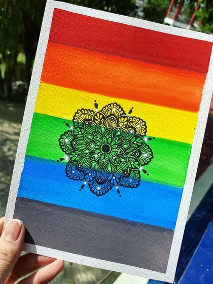 In celebration of Pride Month, I created this piece featuring a detailed black mandala over a vibrant watercolor rainbow background. The sparkle details add a touch of magic.