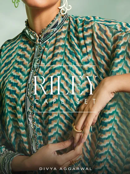 The Riley Cape Set features prints that resemble tropical freshness. I added mirror work and a breezy silhouette to create a look of utter grace for any sunny day.