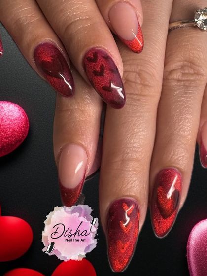 Love is in the air. This Valentine's set features a deep red cat eye polish with subtle heart details for a sultry and romantic look.