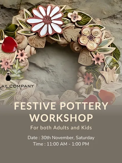 A stunning, handcrafted festive wreath made from intricately shaped and glazed clay flowers and leaves. This piece is a testament to the artistic possibilities of ceramics and makes a beautiful statement decor item.
