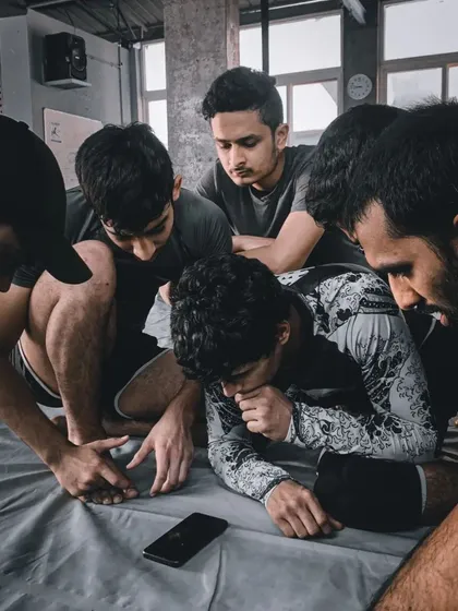 Jiu-jitsu is more than just physical moves; it's a deliberate and detailed study. Here, we are breaking down footage, analyzing techniques, and understanding the 'why' behind every action. This is how you build fight IQ.