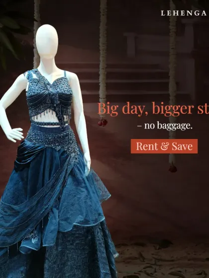 Big day, bigger style, no baggage. This modern navy blue layered gown with a stunningly embellished crop top is an edgy and fashionable choice for a reception.