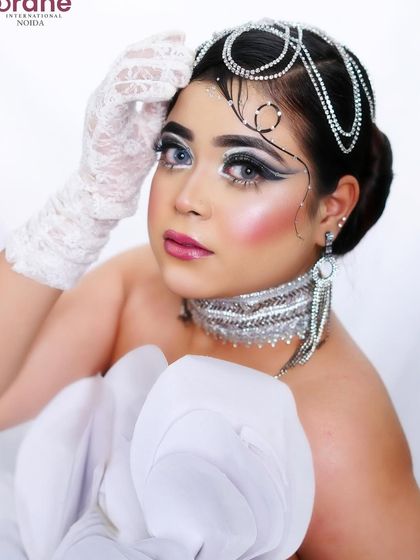 This angle showcases the unique, artistic details drawn onto the forehead and temple.