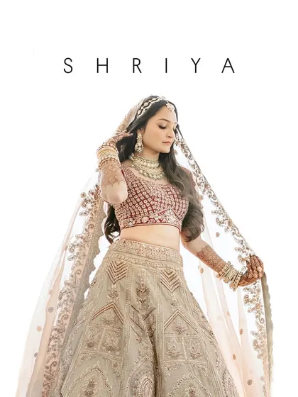 A beautiful, clean portrait of the bride, showcasing her flawless look and stunning jewelry. The white background makes her elegance and beauty the sole focus.