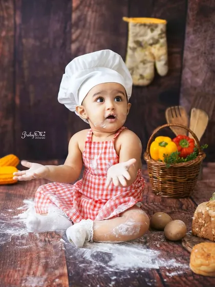 "What happened to all the flour?" This messy chef shot is full of humor and personality. I love it when babies really get into their roles.