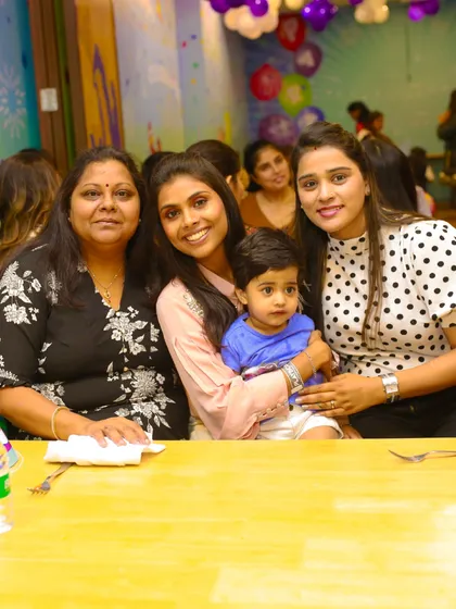 Families enjoying the celebration together. Our seating areas are arranged to let parents relax and socialize while the kids have fun.