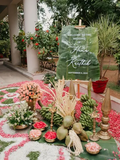 Personalization is at the heart of our craft. For Hema and Karthik's Tamil wedding, we created this unique welcome board on a banana leaf, blending tradition with bespoke design to set a poetic and deeply personal tone from the very first moment.