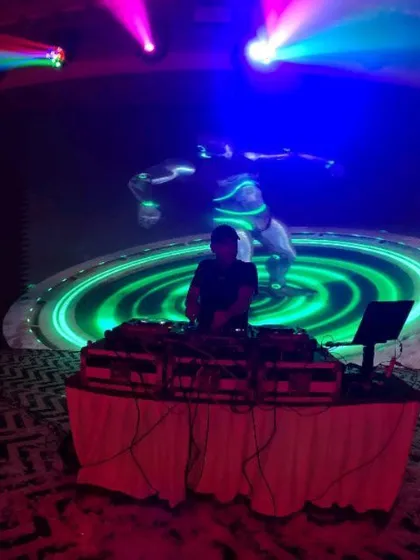 My setup for a large-scale event at Hubli, featuring a curved LED wall. I use custom visuals like this swirling vortex to create a futuristic and mesmerizing backdrop that pulls the audience into the music.