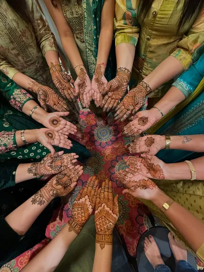 A circle of love and henna. Here are all the beautiful mehendi designs I created for the groom's family and friends.