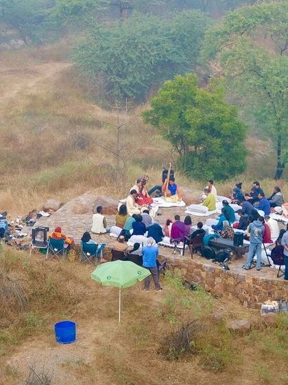 An aerial view of the audience settled in the Baithak, a beautiful manch created from natural materials, for the Raag Bhairav performance.