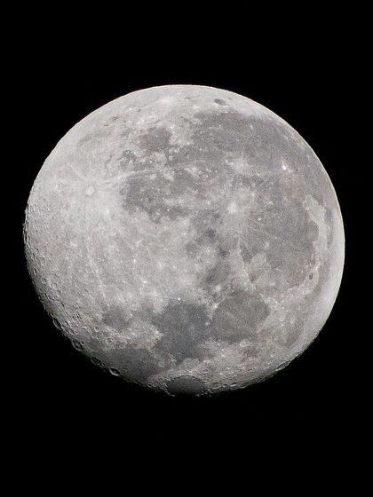Another sharp, detailed photograph of the moon, showing the craters and textures of the lunar surface.