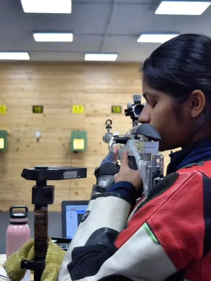 We are dedicated to fostering champions in every category. This action shot captures one of our female athletes during a 10m Air Rifle ISSF competition, showcasing the skill and poise we instill in all our shooters.