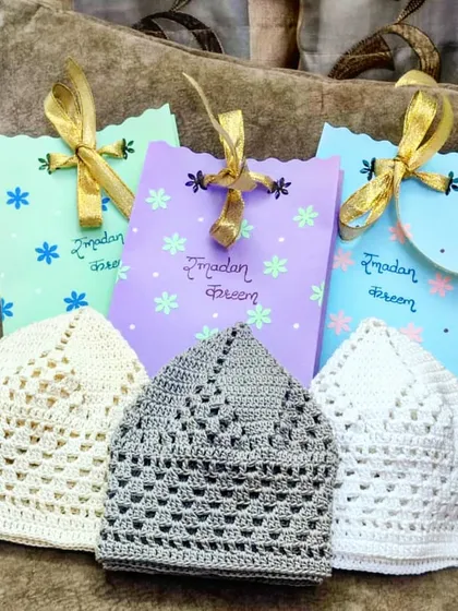 Our handmade crochet prayer caps, also known as topi or taqiyah, ready for Ramadan. We offer these in various patterns and neutral colors like white, grey, and off-white.