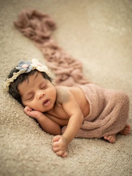A classic side-sleeping pose that shows off every perfect little feature. These are the moments you'll want to remember forever.