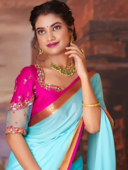 A lovely series of a model in a light blue and pink saree, wearing our simple green bead choker. This is a perfect look for a bridesmaid or a guest at a wedding.