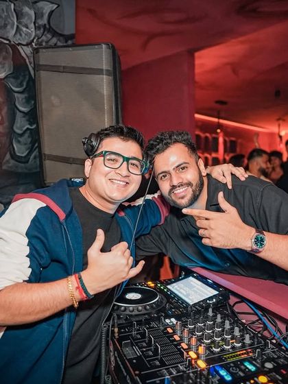 Posing with a friend behind the decks. The nightlife community in Mumbai is all about supporting each other.
