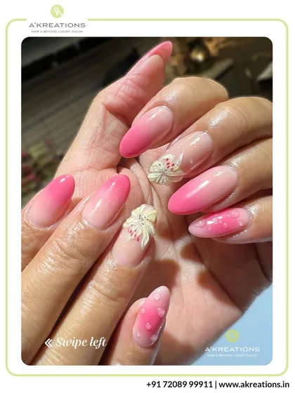 We specialize in 3D nail embellishments, including sculpted floral details combined with a soft pink ombre and heart patterns for a romantic, textured finish.