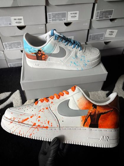 A custom Nike Air Force 1 inspired by the movie "Salaar," with a fiery orange and cool blue color scheme representing the film's duality.