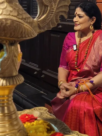 A quiet moment of reflection by the traditional lamp after the award ceremony. I am filled with gratitude for this journey in dance.
