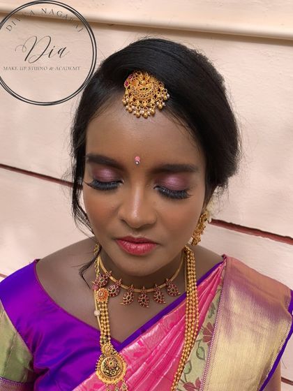 Another view of the Seemantha makeup, focusing on the eye work. The shimmery eyeshadow and long lashes make her eyes pop, while the traditional bindi and maang tikka complete the look.