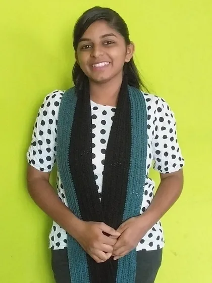 A casual, open way to wear the handmade muffler.