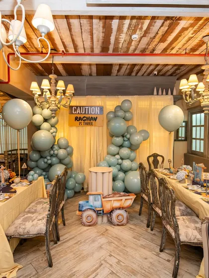 Even a rugged theme like construction can be elegant. For Raghav's third birthday, I designed a polished and fun party space, complete with themed tablescapes and sophisticated balloon arrangements in a muted color palette.