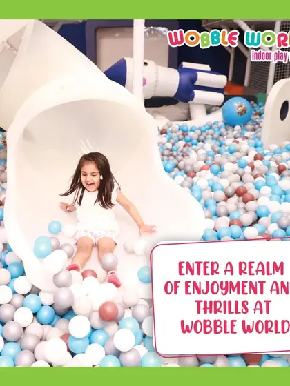 This little one is having a blast on her way into the ball pit. The joy of sliding is a timeless childhood pleasure we love to provide.
