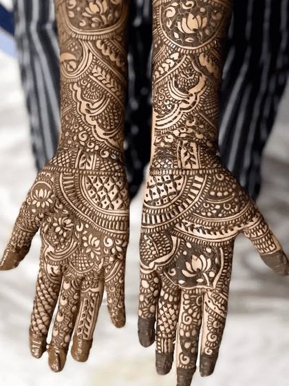 Look at the confidence in this student's work. The design features intricate patterns and perfectly balanced lotus motifs, all learned during the course.