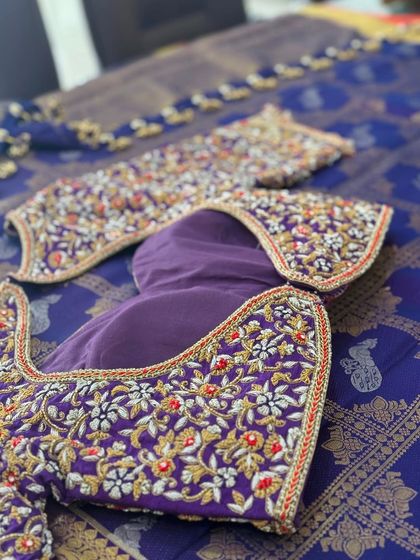 The full layout of the purple and red blouse.