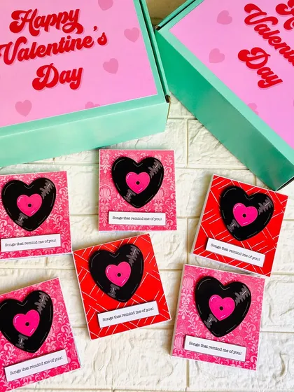 A glimpse of my Valentine's Day collection, featuring themed gift boxes and adorable heart-shaped record player cards. I love creating these little tokens of love.