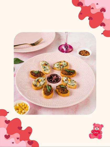 A plate of assorted bruschetta, perfect for sharing on a special night.