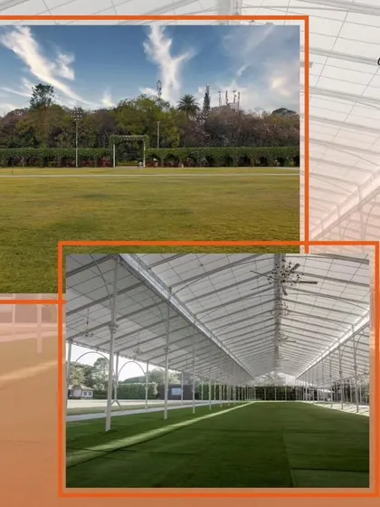 The expansive lawn and large semi-permanent tent structure at one of our outdoor venues, ideal for hosting exhibitions, large dining events, or trade shows.