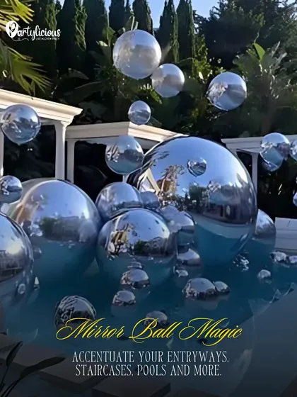 Mirror Ball Magic. Accentuate your entryways, staircases, or even pools with these floating reflective spheres for a touch of modern glamour.