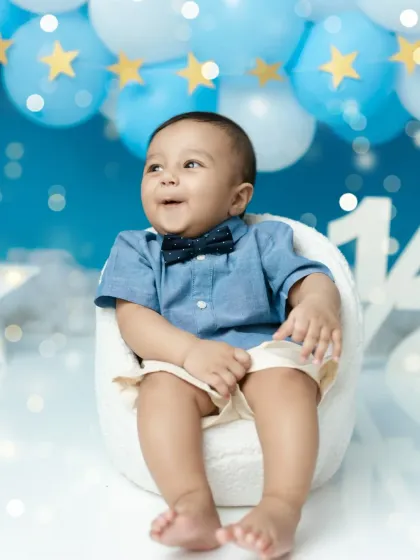 Celebrating the half-year mark. This little boy is looking dapper with his bowtie in our 'twinkle twinkle little star' themed half-birthday shoot.