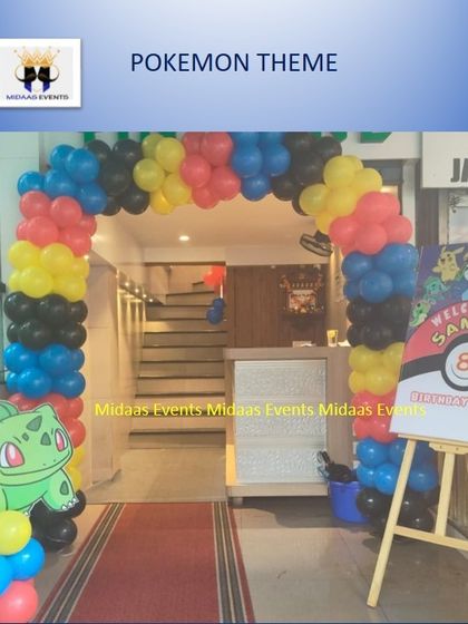 The Pokémon adventure started right at the entrance. I created a balloon arch in the theme's colors and placed a Bulbasaur cutout and a personalized welcome sign to greet the party guests.