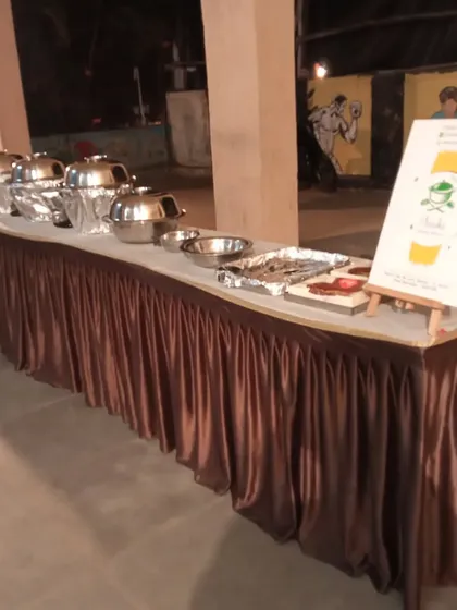 A simple buffet table with my branding displayed on an easel. This is a neat setup for smaller functions or corporate events.