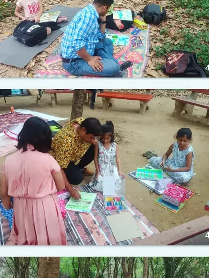 Our Nature Study Workshop in progress. Students and instructors sit together in a park, drawing inspiration directly from the natural environment around them for their artwork.
