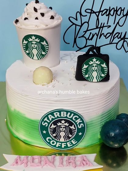 A fun cake for a Starbucks coffee lover, featuring the iconic green logo and a coffee cup topper.