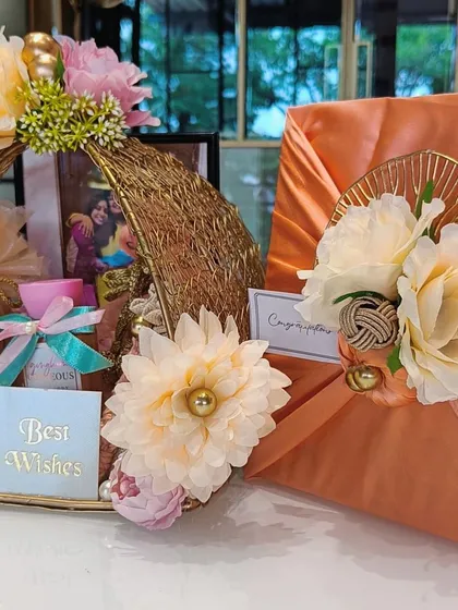 A slightly different angle of the complete wedding gift set, showing how the colors and floral arrangements tie the two pieces together.