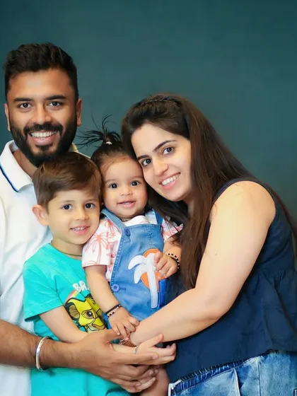 A happy family of four, all bundled together. I love capturing the energy and love in a growing family.