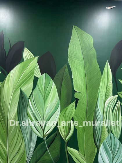 A close-up of a lush tropical leaf mural. The detail in the leaf veins and the layering of different greens create a realistic and immersive jungle feel.