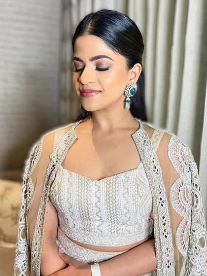 With her eyes closed, you can see the delicate blending and soft shimmer that create this radiant and sophisticated look.