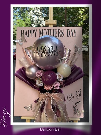 A full view of our "Inflated Affection" balloon postcard on an easel. The combination of the large card and the 3D balloon bouquet creates a gift with major wow-factor.