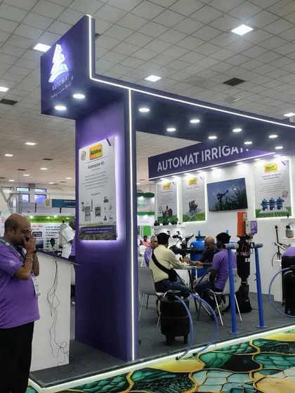 A side view of our bustling booth at Agri Intex 2025, showcasing our branding and product displays. The open design invites visitors to step in and learn more.