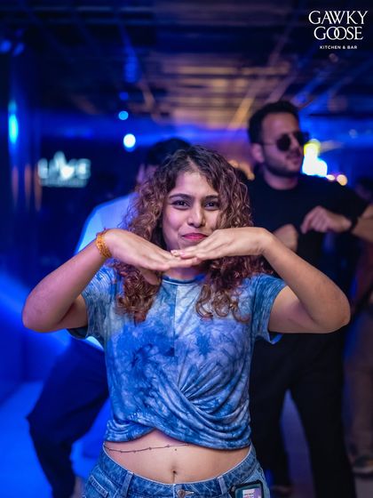 Fun and expressive moments from the crowd at Gawky Goose. It's these personal connections that make a party special.