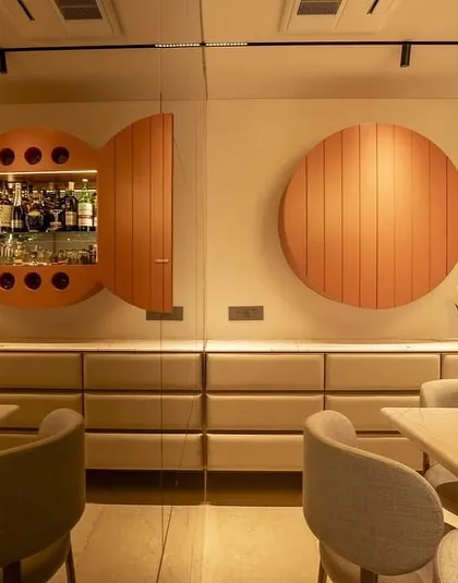Function meets artistry in this bespoke bar cabinet I designed for a residence at Oberoi Sky City. The circular, fluted doors open to reveal a fully equipped bar, serving as a sculptural statement piece that is both surprising and sophisticated.
