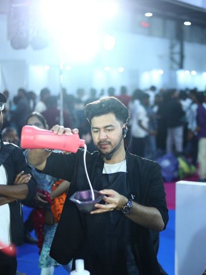 Here I am at the Professional Beauty India event, mixing color on the Colour Pod stage. It was an honor to present my vision for imaginative color work.