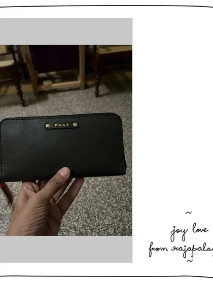 A custom Joy wallet for our patron Prasanna. She chose a classic Moss green for the exterior and a vibrant, surprising pop of Carrot orange for the interior, complete with a personalized monogram.