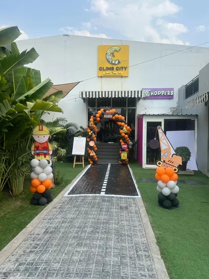 The entrance to our venue transformed into a construction zone. We use large props and custom signage to create an immersive experience from the moment guests arrive for a themed birthday party.